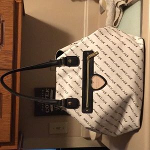 Brand new purse with detachable makeup bag!!